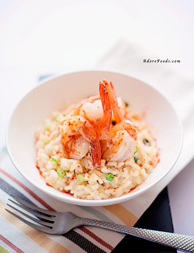 Garlic Prawn Risotto recipe is perfect comfort food for a weeknight dinner. In just 30 minutes you'll have it ready to be served! 