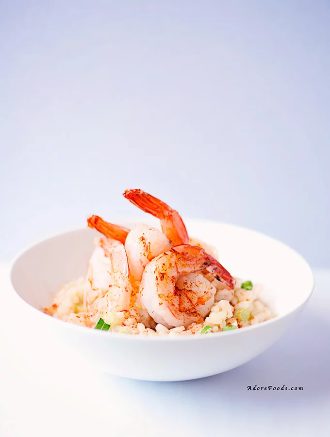 This creamy garlic Prawn Risotto is the perfect weeknight dinner recipe, so easy to make and will be ready in less than 30 minutes! 