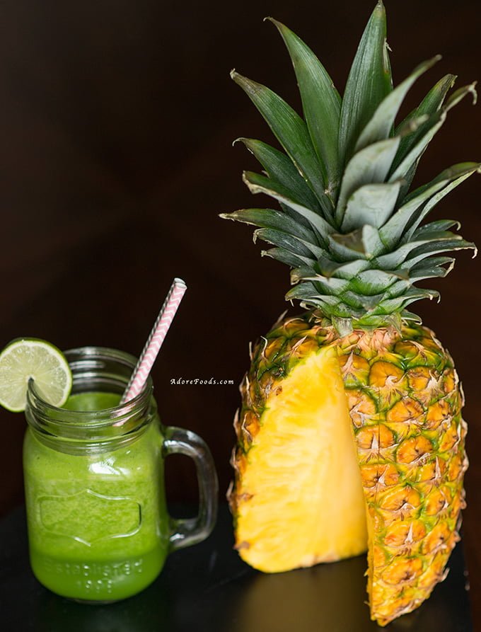 Pineapple and Kale Juice next to a pineapple