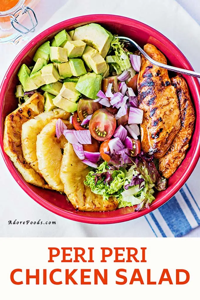 Looking for easy and healthy lunch ideas? Try this grilled peri peri chicken salad loaded with avocado, pineapple, lettuce, tomatoes and red onions! No mayo needed. You can use your favorite dressing or try it with my favorite olive oil and lime dressing. Best summer salad a simple and light recipe that can be served as dinner too. Clean eating recipe #grilledchickensalad