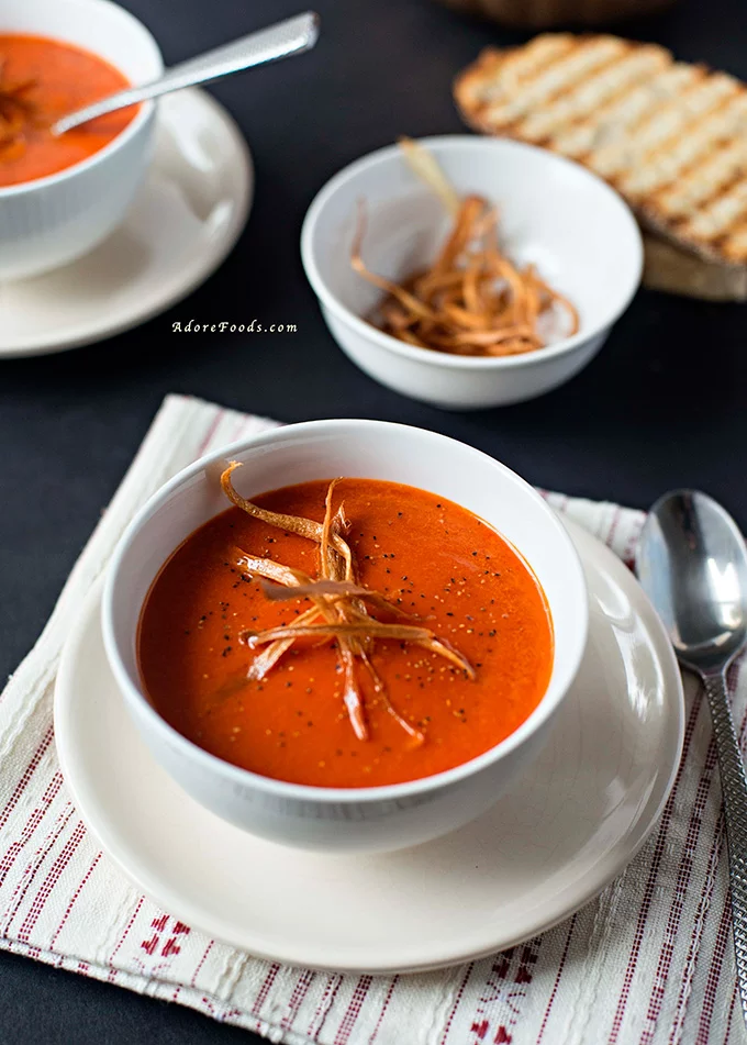 This creamy roasted red pepper soup is quick and easy to put together with the main ingredient being bell peppers. Silky and hearty, it is ideal for dunking bits of bread or sandwiches!