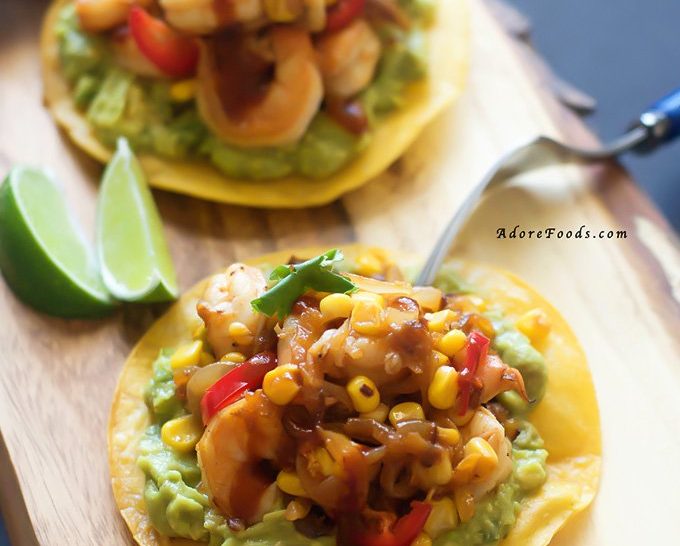 Spicy Chipotle Shrimp & Corn Tostadas - crunchy corn tortillas, creamy adobo guacamole and juicy shrimp and corn topping. One of the best tostadas I have ever eaten.