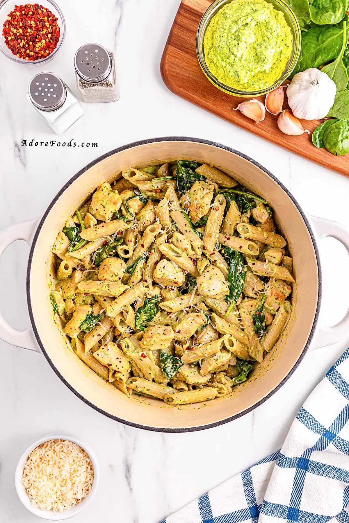 This one pot creamy pesto chicken pasta is everything you want in a weeknight dinner&mdash;quick, cozy, and full of flavor! It&rsquo;s one of our favorite chicken basil pesto pasta recipes and takes just 30 minutes. The perfect cheap and easy dinner idea for busy nights! 
