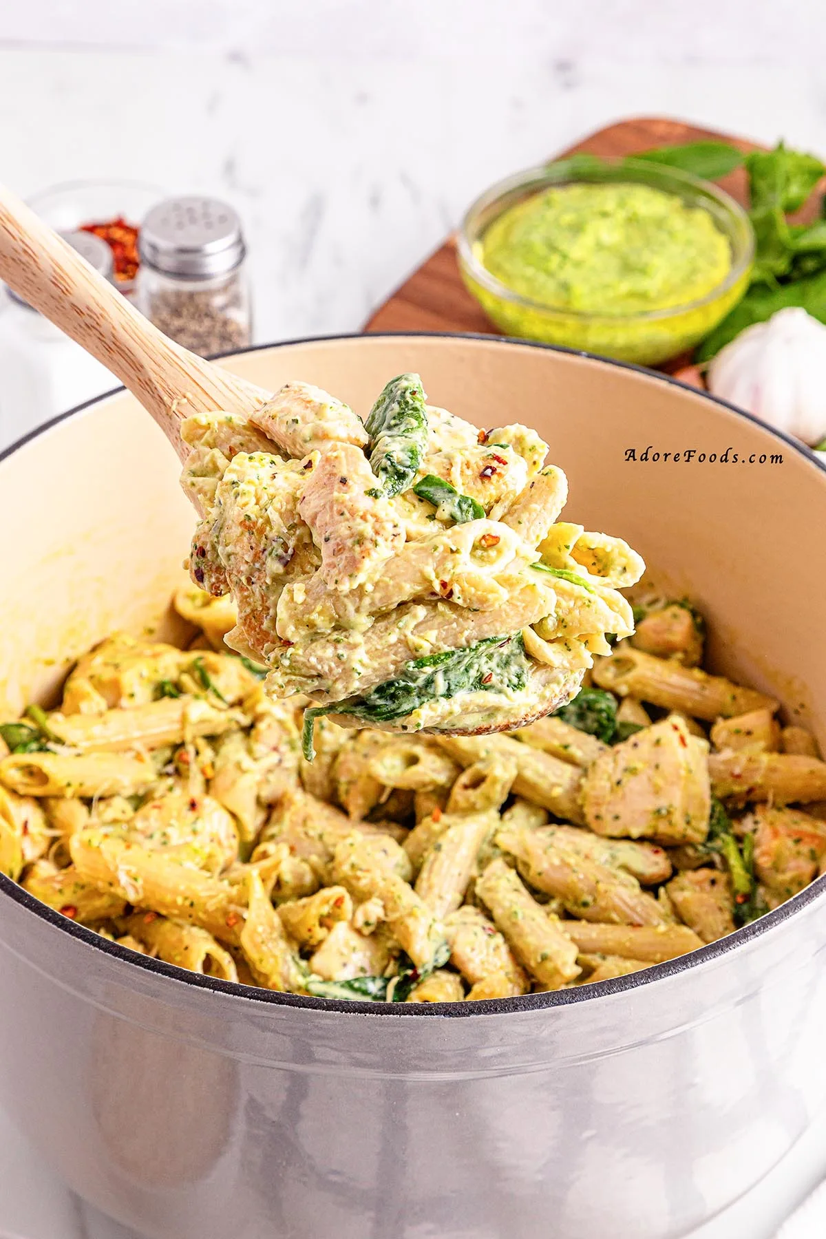 This one pot creamy pesto chicken pasta is everything you want in a weeknight dinner&mdash;quick, cozy, and full of flavor! It&rsquo;s one of our favorite chicken basil pesto pasta recipes and takes just 30 minutes. The perfect cheap and easy dinner idea for busy nights! 