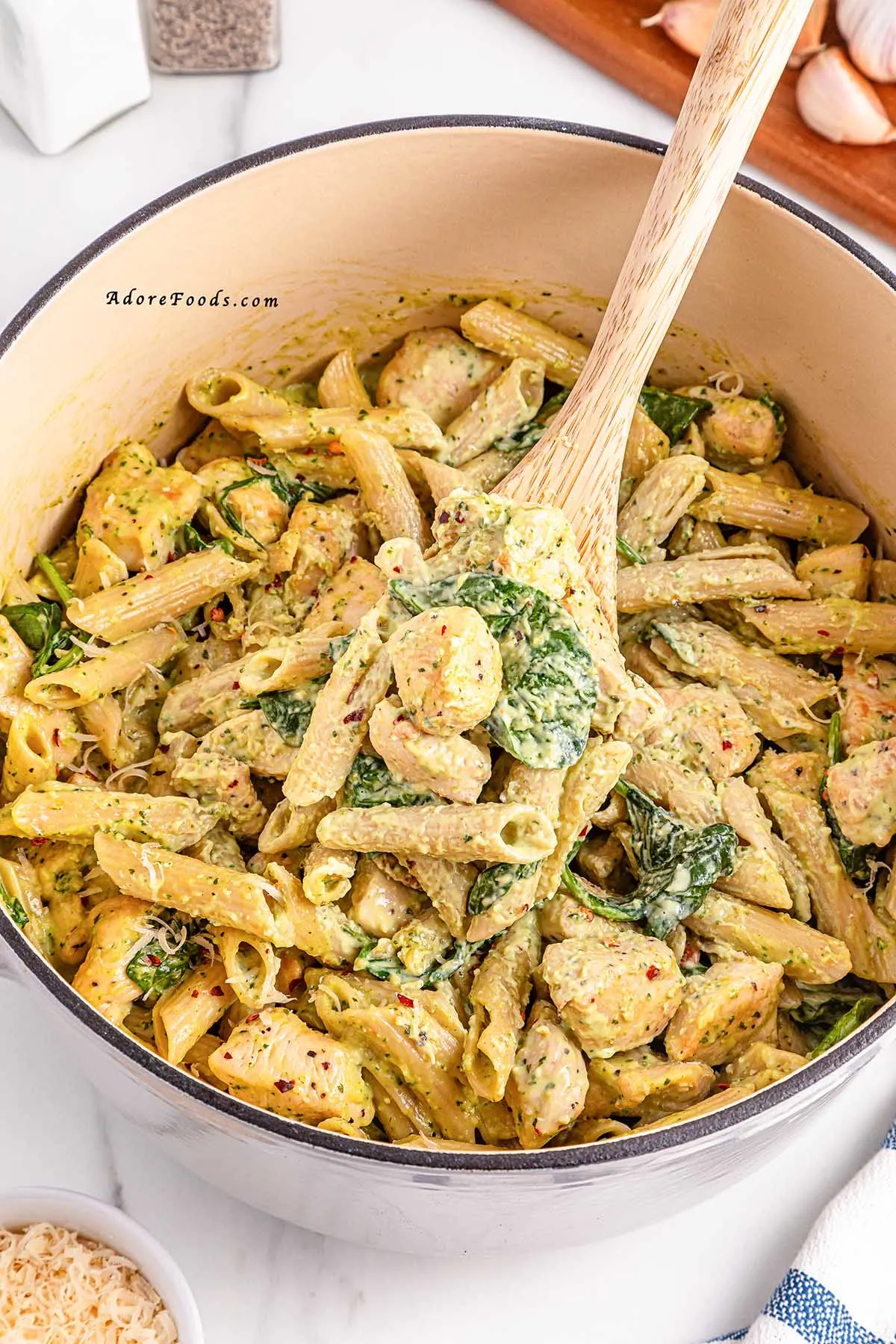 This one pot creamy pesto chicken pasta is everything you want in a weeknight dinner&mdash;quick, cozy, and full of flavor! It&rsquo;s one of our favorite chicken basil pesto pasta recipes and takes just 30 minutes. The perfect cheap and easy dinner idea for busy nights! 