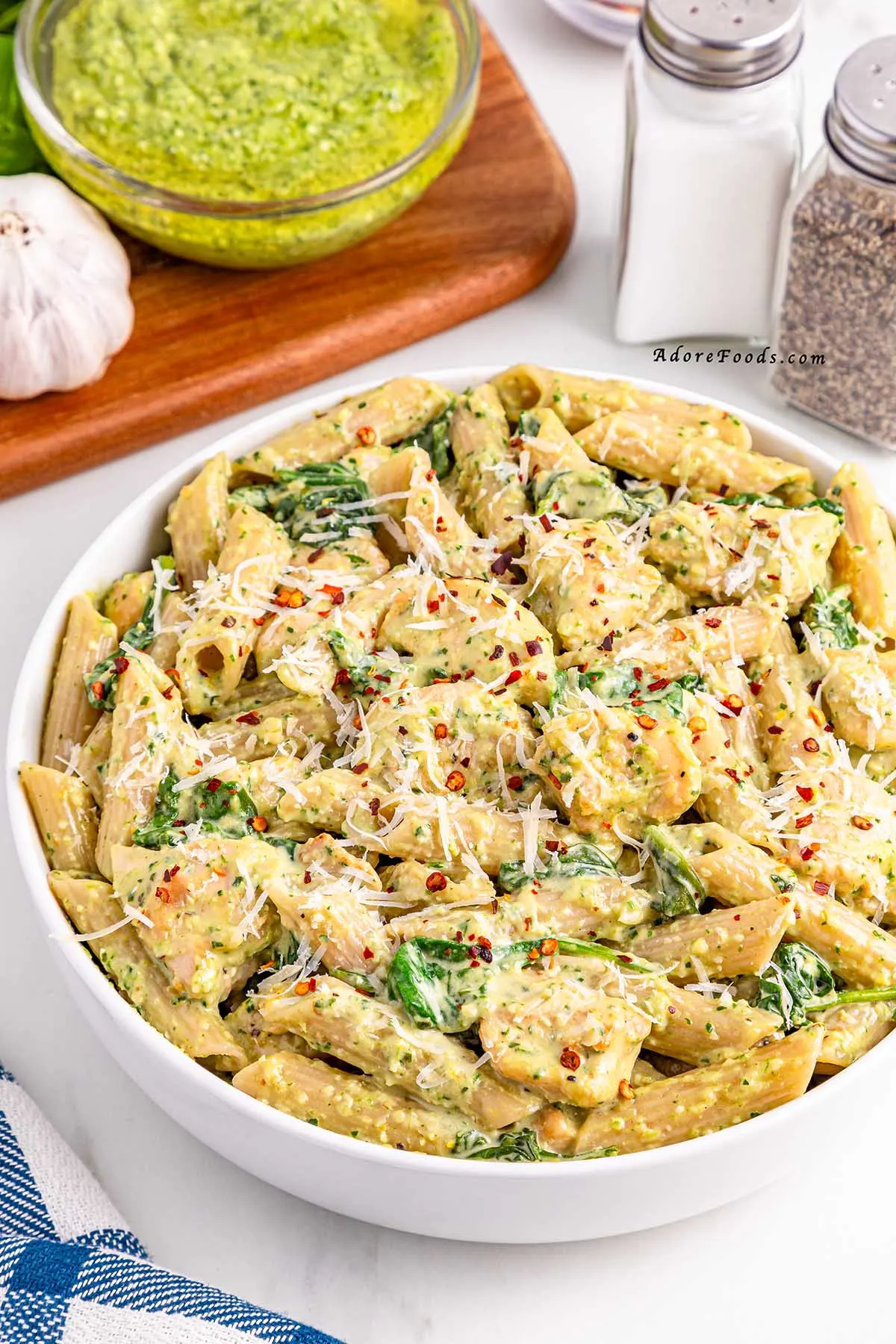 This one pot creamy pesto chicken pasta is everything you want in a weeknight dinner&mdash;quick, cozy, and full of flavor! It&rsquo;s one of our favorite chicken basil pesto pasta recipes and takes just 30 minutes. The perfect cheap and easy dinner idea for busy nights! 