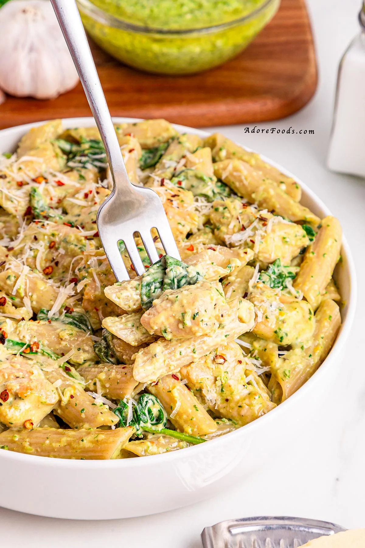 This one pot creamy pesto chicken pasta is everything you want in a weeknight dinner&mdash;quick, cozy, and full of flavor! It&rsquo;s one of our favorite chicken basil pesto pasta recipes and takes just 30 minutes. The perfect cheap and easy dinner idea for busy nights! 