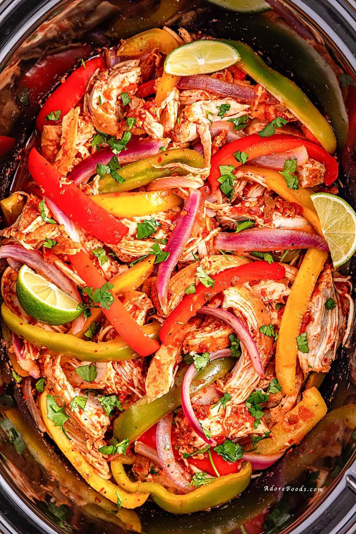 Easy Crockpot Chicken Fajitas made with juicy chicken, colorful bell peppers, and zesty fajita seasoning&mdash;perfect for a flavorful and effortless weeknight dinner! Just 10 minutes of prep and the slow cooker does the rest. Serve in tortillas, bowls, or over rice. Great for meal prep, family dinners, and Tex-Mex nights!