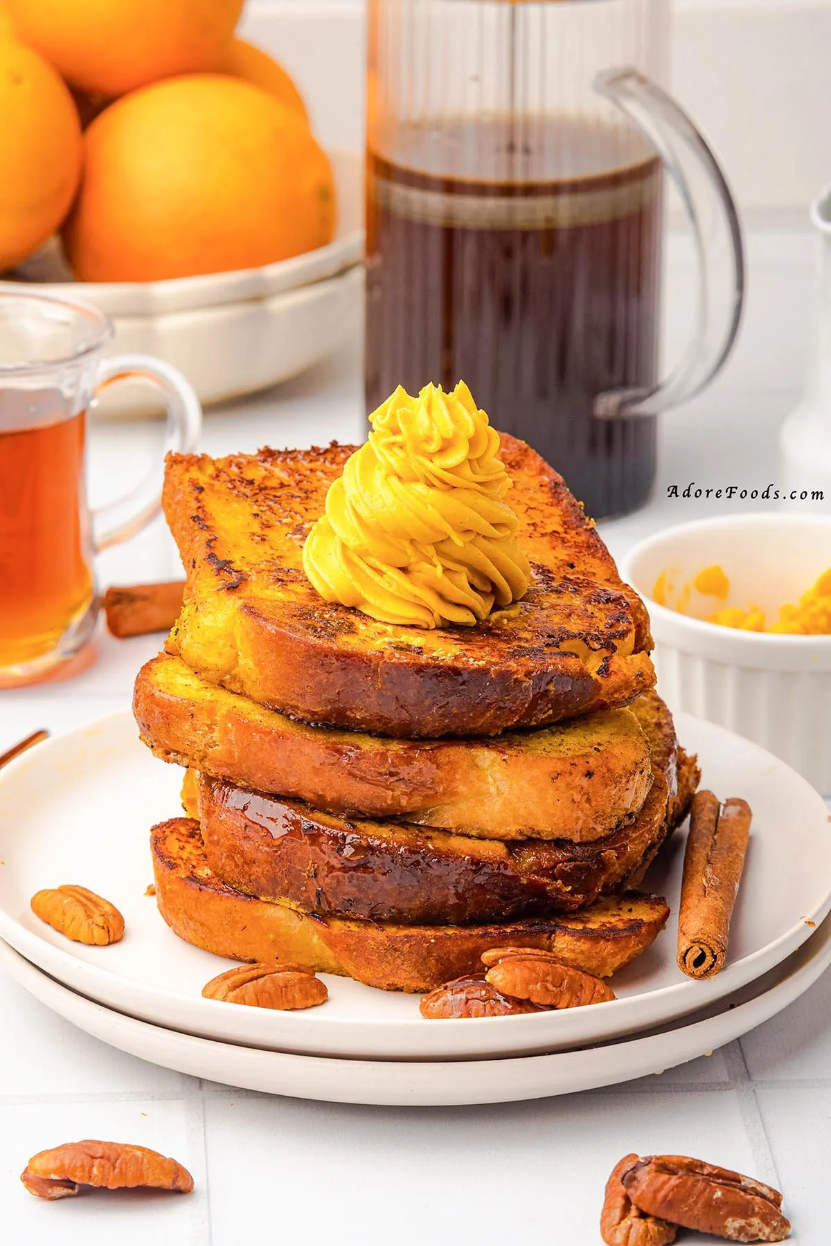 Warm, cozy, and full of fall flavor, this Pumpkin French Toast is made with thick brioche slices dipped in a creamy pumpkin custard, sprinkled with pumpkin pie spice, and cooked to golden perfection. Topped with whipped pumpkin butter and drizzled with maple syrup, it’s the perfect autumn breakfast or holiday brunch recipe your taste buds will love!