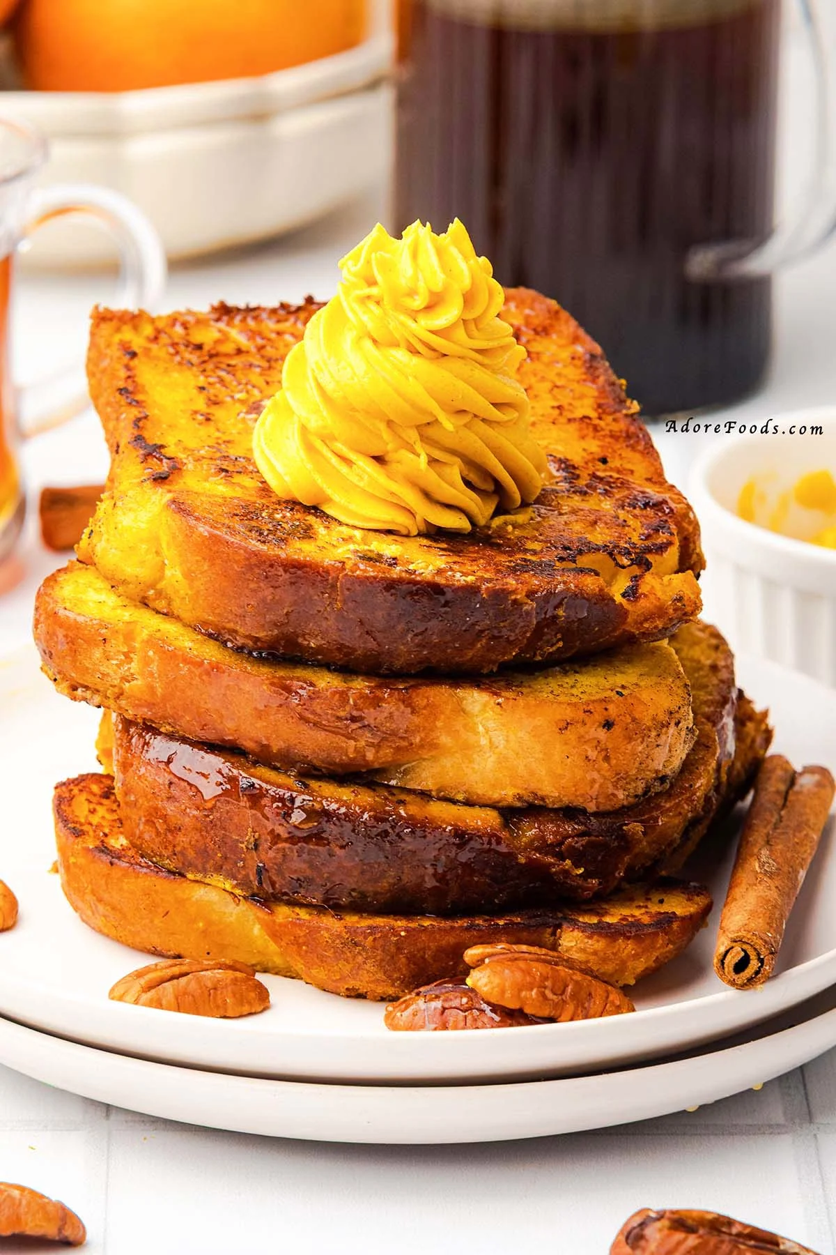 Warm, cozy, and full of fall flavor, this Pumpkin French Toast is made with thick brioche slices dipped in a creamy pumpkin custard, sprinkled with pumpkin pie spice, and cooked to golden perfection. Topped with whipped pumpkin butter and drizzled with maple syrup, it’s the perfect autumn breakfast or holiday brunch recipe your taste buds will love!