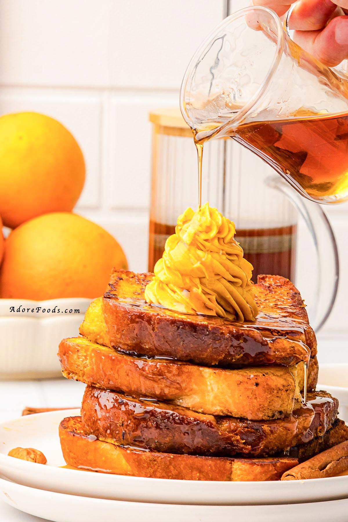 Warm, cozy, and full of fall flavor, this Pumpkin French Toast is made with thick brioche slices dipped in a creamy pumpkin custard, sprinkled with pumpkin pie spice, and cooked to golden perfection. Topped with whipped pumpkin butter and drizzled with maple syrup, it’s the perfect autumn breakfast or holiday brunch recipe your taste buds will love!