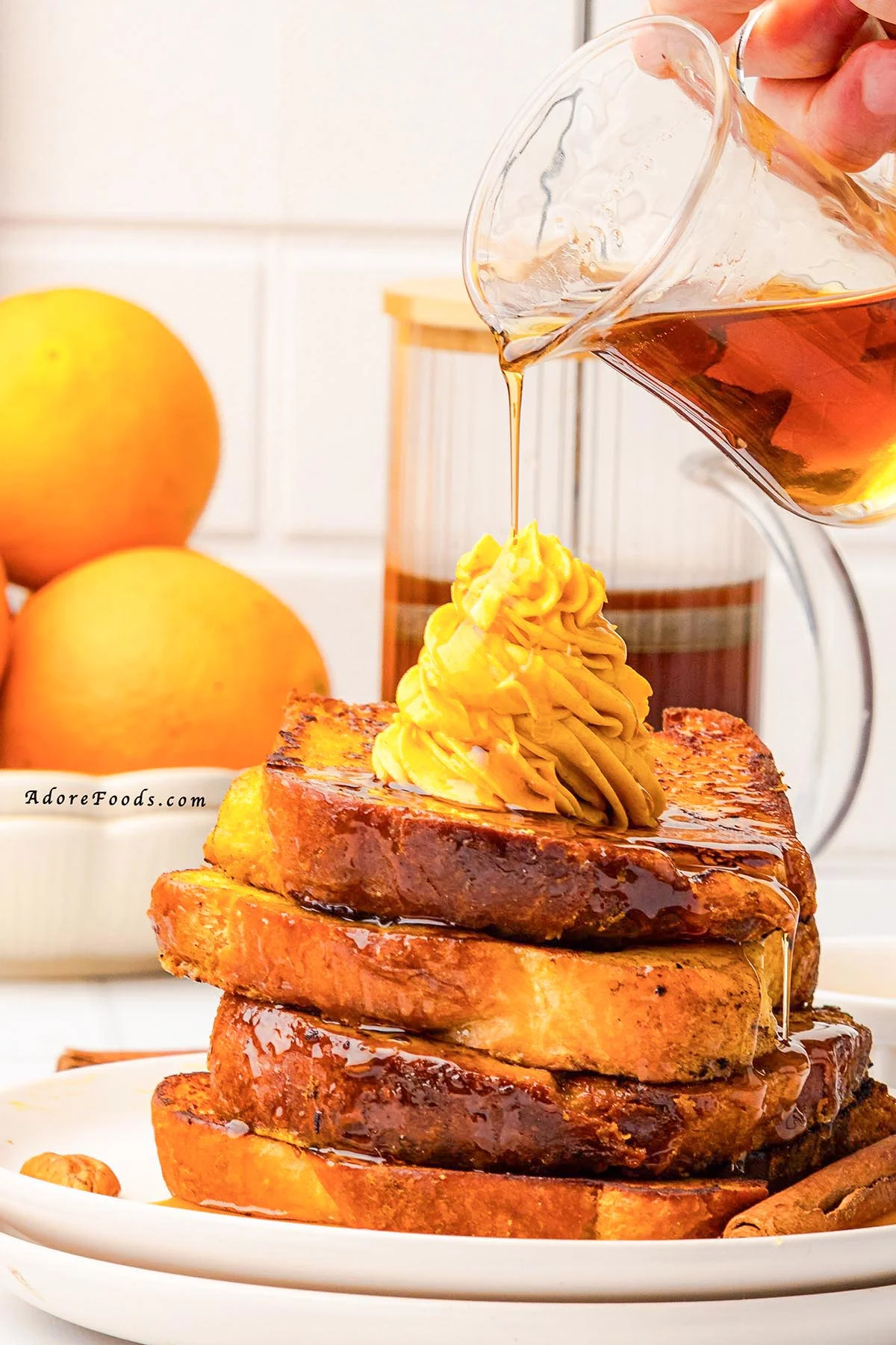 Warm, cozy, and full of fall flavor, this Pumpkin French Toast is made with thick brioche slices dipped in a creamy pumpkin custard, sprinkled with pumpkin pie spice, and cooked to golden perfection. Topped with whipped pumpkin butter and drizzled with maple syrup, it’s the perfect autumn breakfast or holiday brunch recipe your taste buds will love!