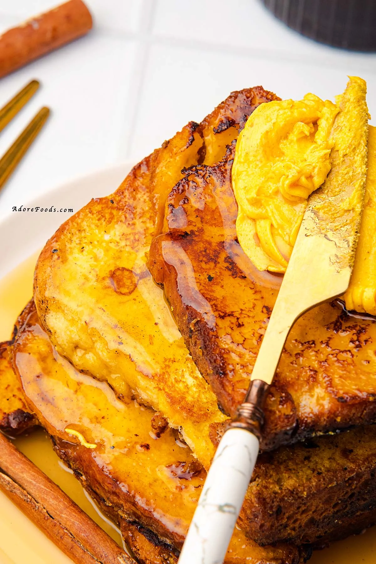 Warm, cozy, and full of fall flavor, this Pumpkin French Toast is made with thick brioche slices dipped in a creamy pumpkin custard, sprinkled with pumpkin pie spice, and cooked to golden perfection. Topped with whipped pumpkin butter and drizzled with maple syrup, it’s the perfect autumn breakfast or holiday brunch recipe your taste buds will love!