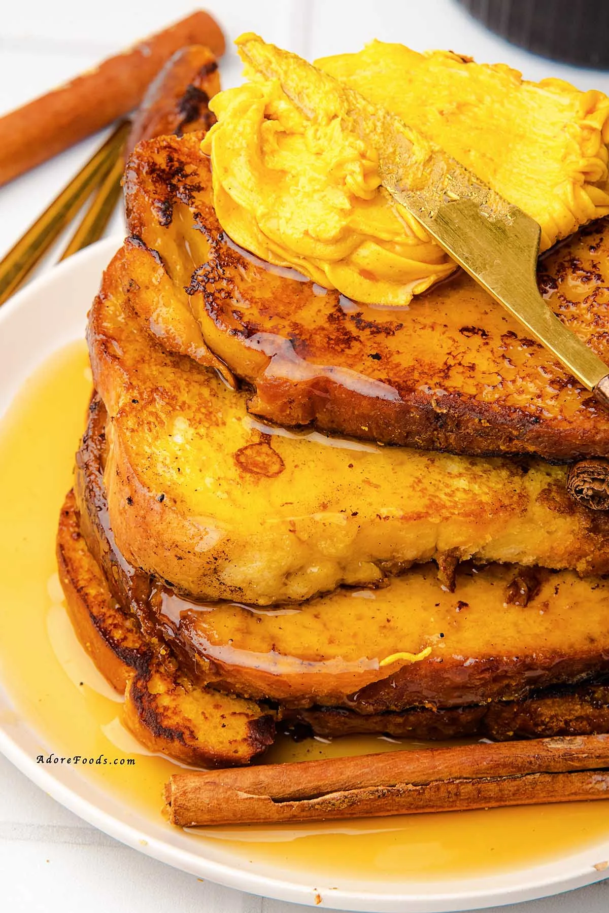Warm, cozy, and full of fall flavor, this Pumpkin French Toast is made with thick brioche slices dipped in a creamy pumpkin custard, sprinkled with pumpkin pie spice, and cooked to golden perfection. Topped with whipped pumpkin butter and drizzled with maple syrup, it’s the perfect autumn breakfast or holiday brunch recipe your taste buds will love!