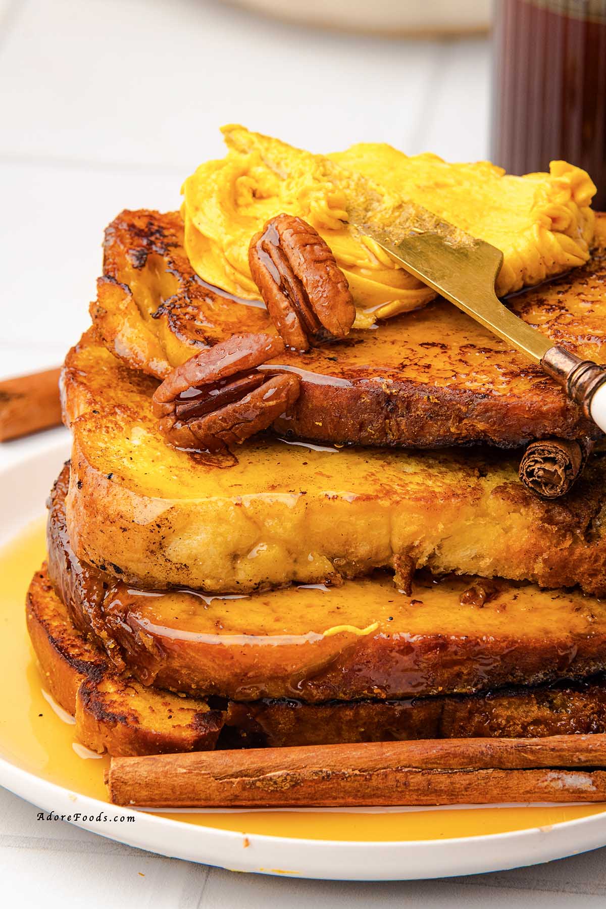Warm, cozy, and full of fall flavor, this Pumpkin French Toast is made with thick brioche slices dipped in a creamy pumpkin custard, sprinkled with pumpkin pie spice, and cooked to golden perfection. Topped with whipped pumpkin butter and drizzled with maple syrup, it’s the perfect autumn breakfast or holiday brunch recipe your taste buds will love!