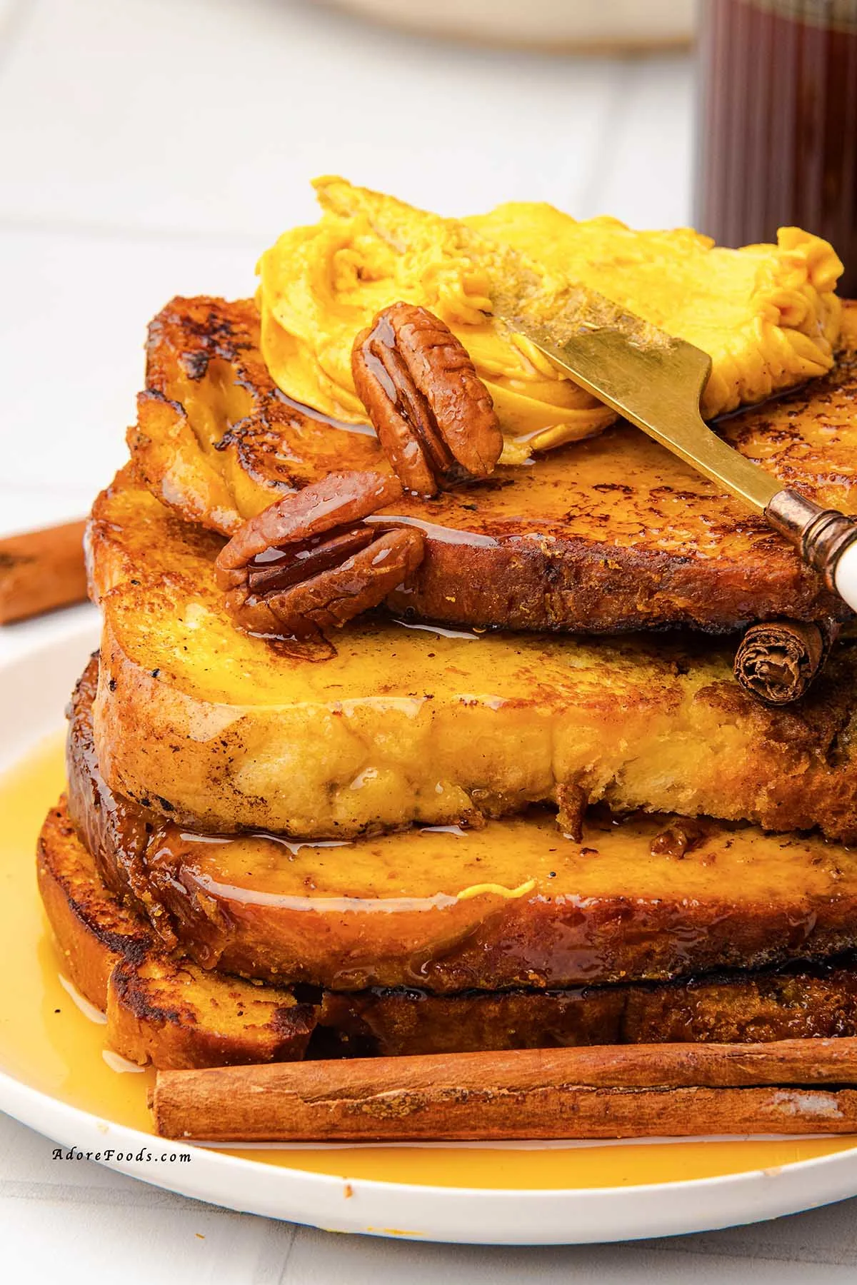 Warm, cozy, and full of fall flavor, this Pumpkin French Toast is made with thick brioche slices dipped in a creamy pumpkin custard, sprinkled with pumpkin pie spice, and cooked to golden perfection. Topped with whipped pumpkin butter and drizzled with maple syrup, it’s the perfect autumn breakfast or holiday brunch recipe your taste buds will love!