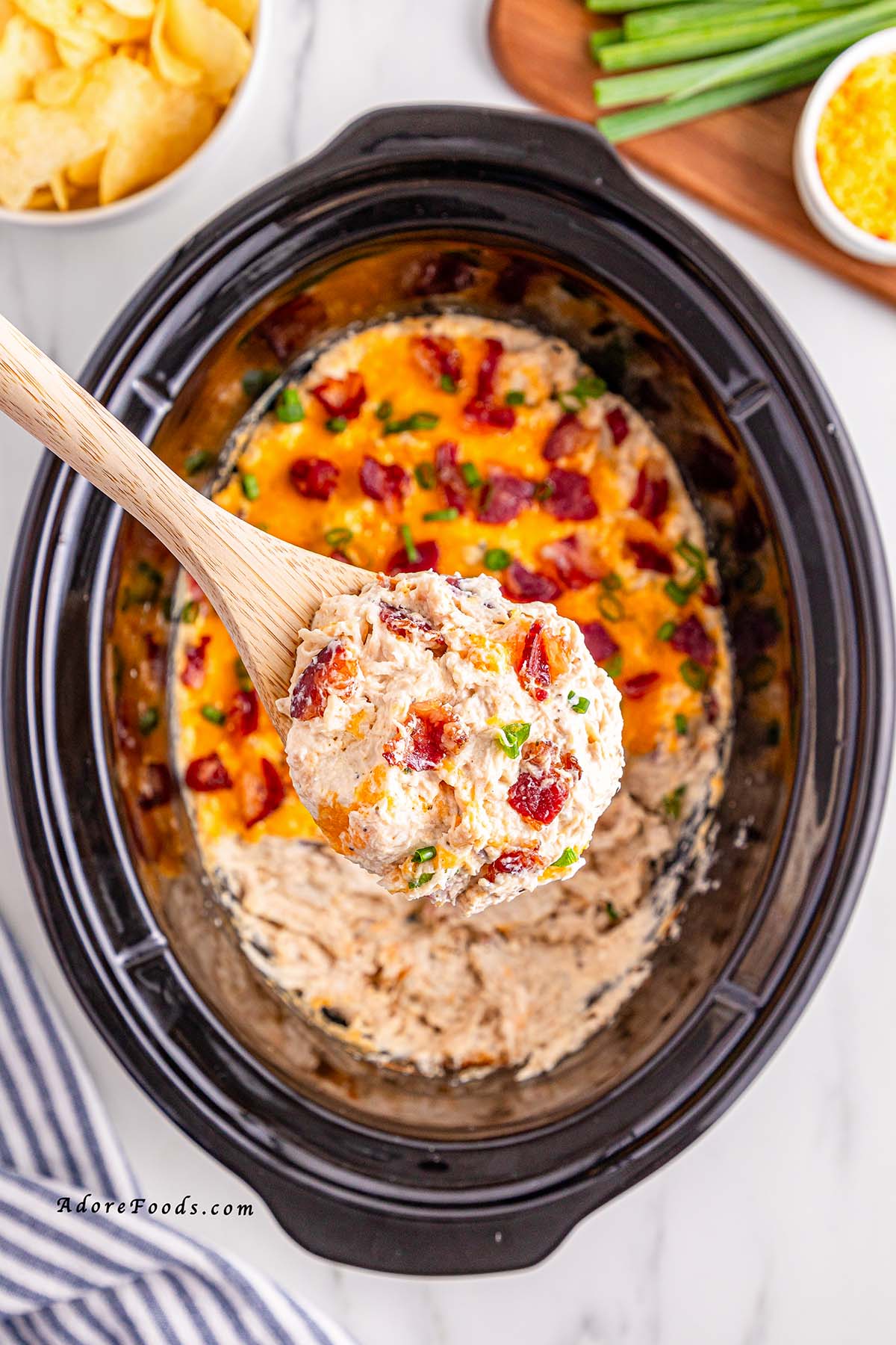 Creamy Crock Pot Crack Chicken made with shredded chicken, ranch seasoning, cream cheese, cheddar, and crispy bacon. Easy slow cooker chicken recipe perfect for family dinners, game day, or cheesy sandwich filling. Comfort food made simple in the Crock Pot.