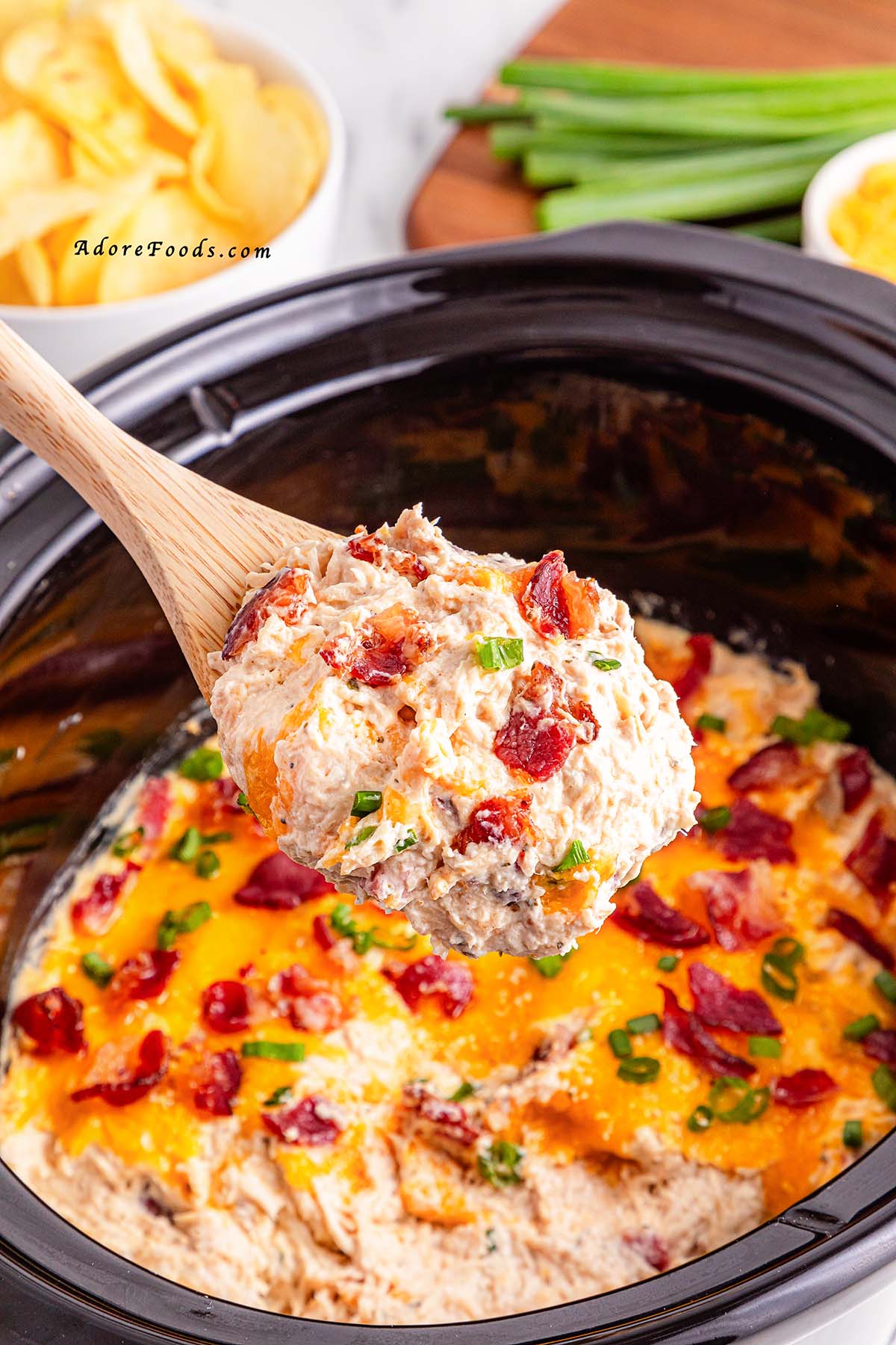 Creamy Crock Pot Crack Chicken made with shredded chicken, ranch seasoning, cream cheese, cheddar, and crispy bacon. Easy slow cooker chicken recipe perfect for family dinners, game day, or cheesy sandwich filling. Comfort food made simple in the Crock Pot.